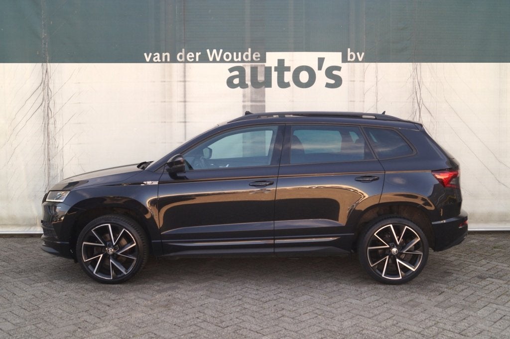 Skoda Karoq 1.5 TSI 150pk DSG Sportline Business -PANO-ECC-N, Auto's, Skoda, Automaat, Stof, 4 cilinders, 150 pk