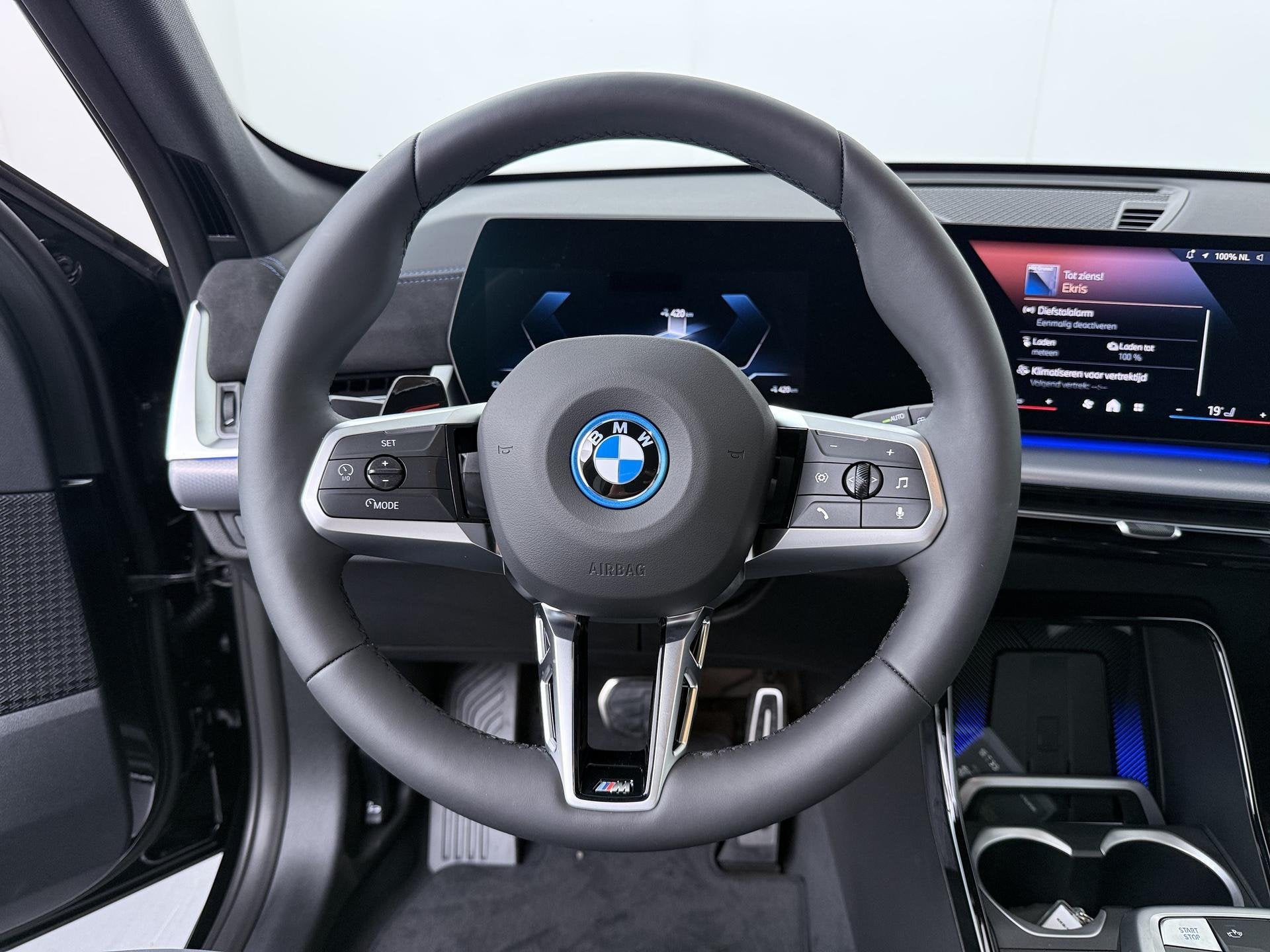 BMW iX1 eDrive20 67 kWh M Sport Edition | SoH 100% | Comfort, Auto's, BMW, 514 km, Met garantie (alle), Zwart, 204 pk