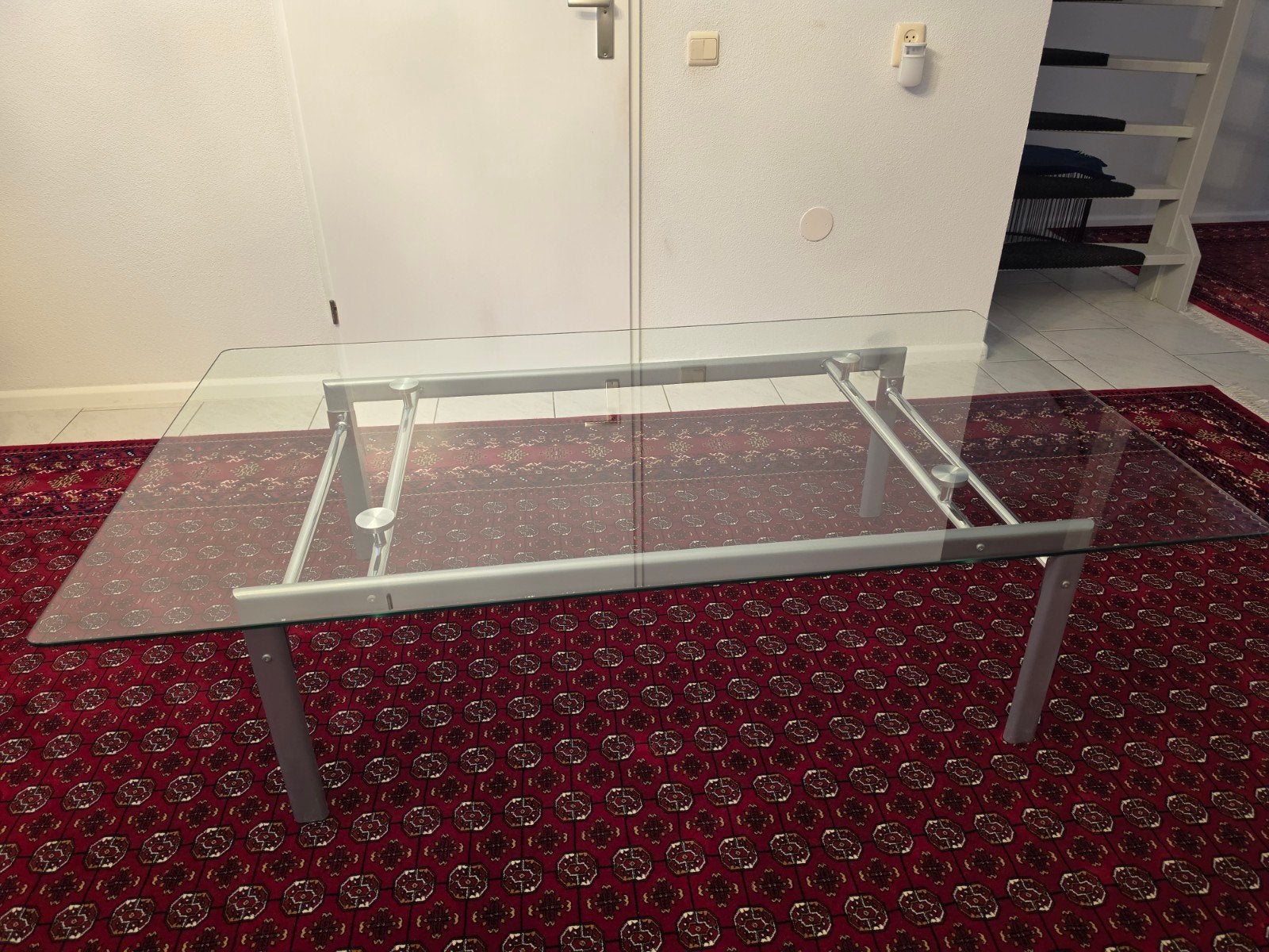 Glazen salontafel met metalen onderstel, 50 – 75, Gebruikt, Glas, 150 tot 200 cm