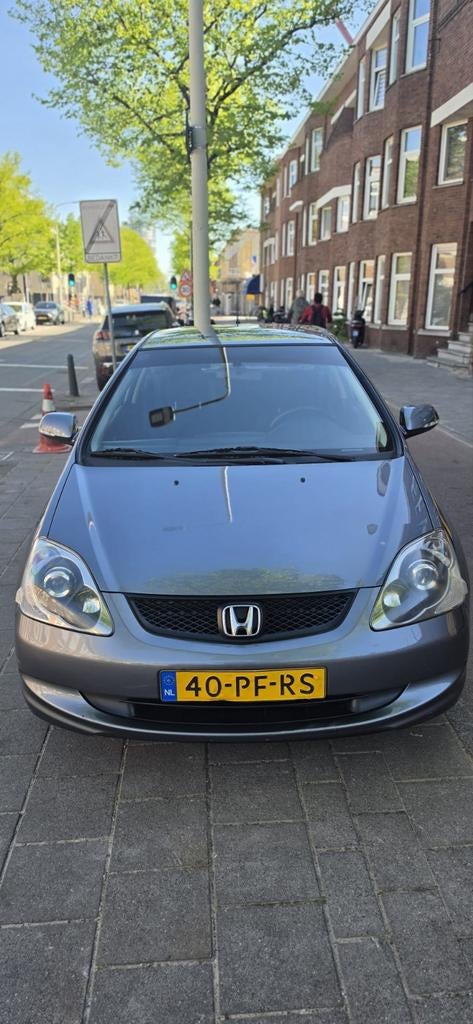 Honda Civic 1.4 I LS 3DR 2004 Grijs 1 week in de advertentie, Auto's, Honda, Voorwielaandrijving, 4 cilinders, 1396 cc, 49 €/maand