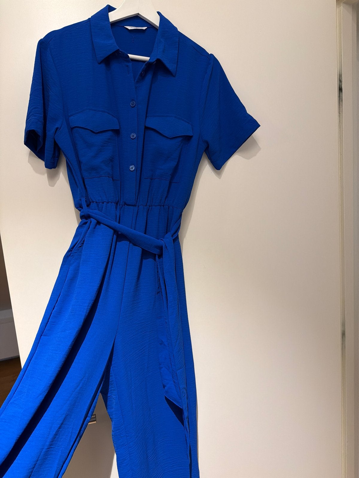 Blauwe jumpsuit met korte mouwen en ceintuur, Ophalen of Verzenden, Zo goed als nieuw, Maat 36 (S), Blauw