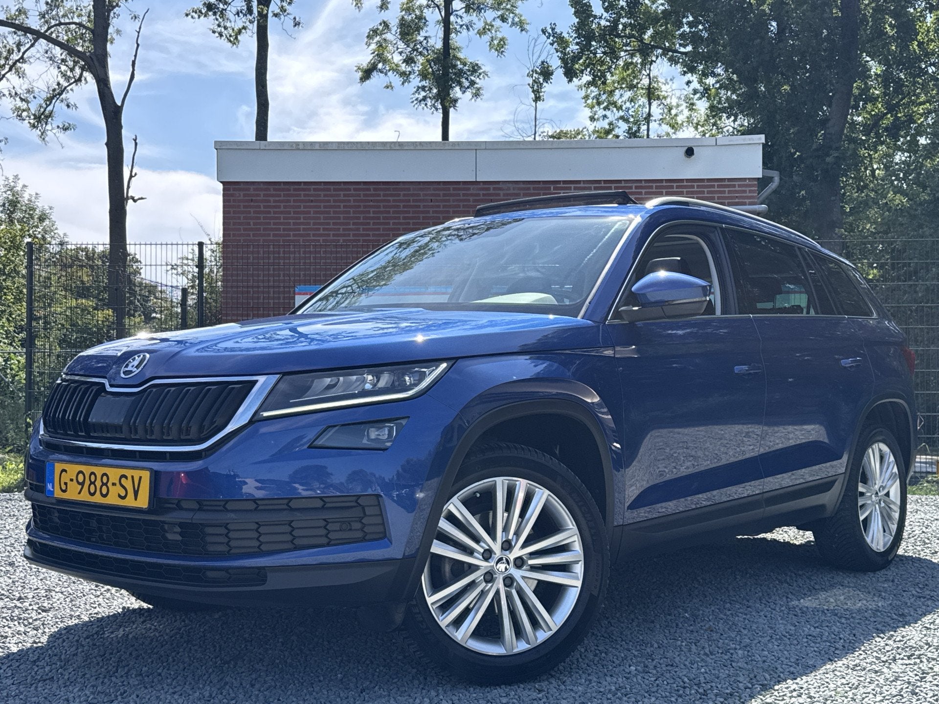 Skoda Kodiaq 1.5 TSI 150PK DSG LIMITED BUSINESS EDITION 7PER, Auto's, Skoda, 12 maanden, 4 cilinders, Blauw, 7 stoelen