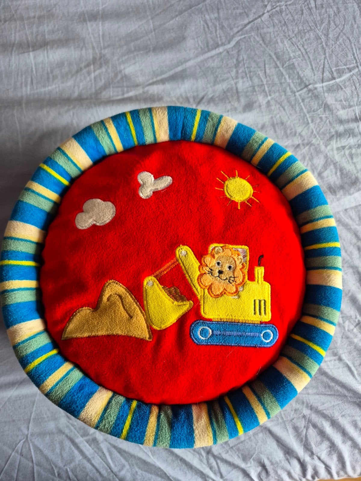 rond speelkussen met zacht  geluidje als je omrolt, Ophalen