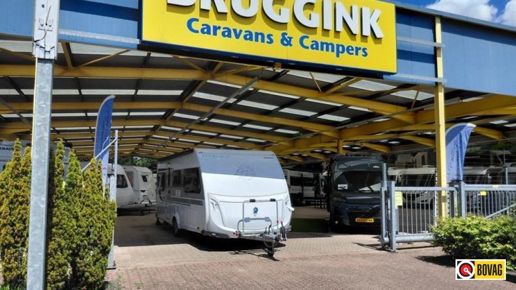 Knaus Sudwind 500 EU - ENKELE BEDDEN - RONDZIT, Caravans en Kamperen, Caravans, Rondzit, Bedrijf, Kachel, 5 tot 6 meter