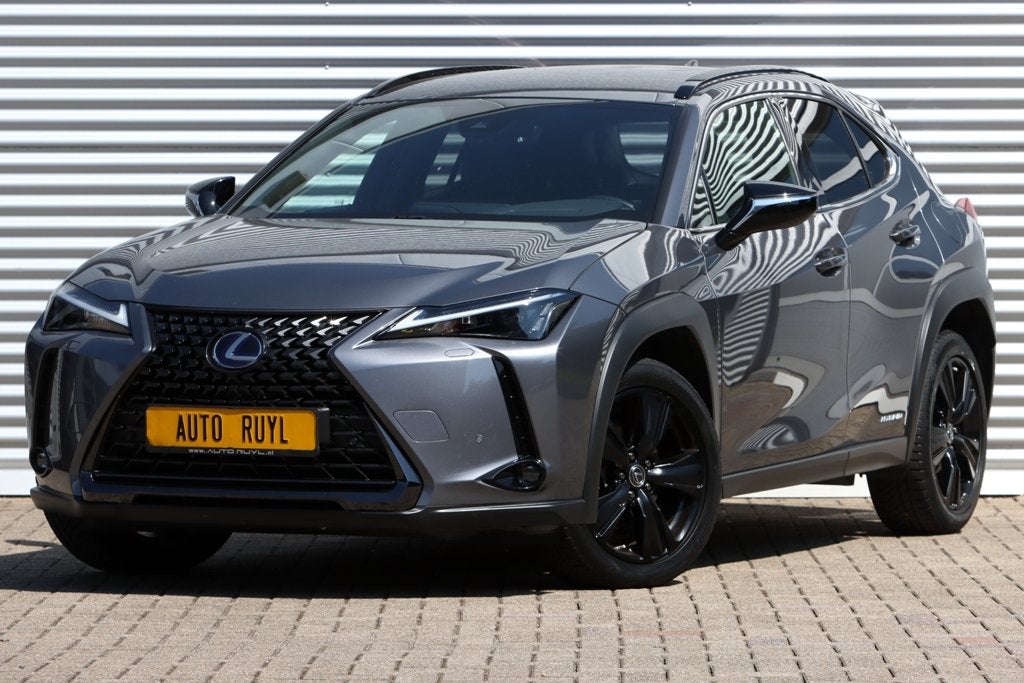 Lexus UX 250h Black Line Leer (bj 2022, automaat), Auto's, Gebruikt, Zwart, 4 cilinders, Bedrijf
