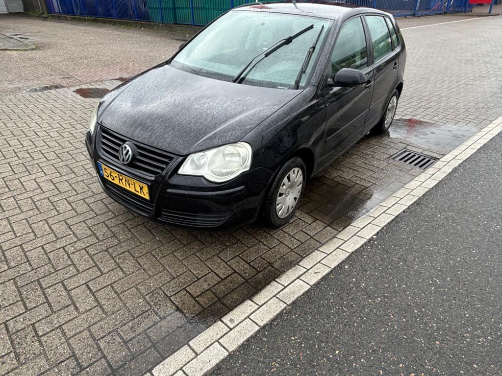 Volkswagen Polo 1.4 55KW 2005 Zwart, Auto's, Voorwielaandrijving, 15 km/l, 74 pk, Zwart