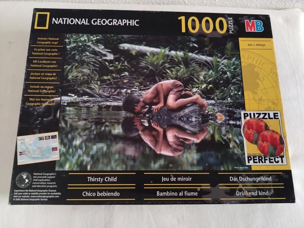 National Geographic 1000 stukjes puzzel - Thirsty Child, Ophalen of Verzenden, 500 t/m 1500 stukjes, Zo goed als nieuw, Legpuzzel