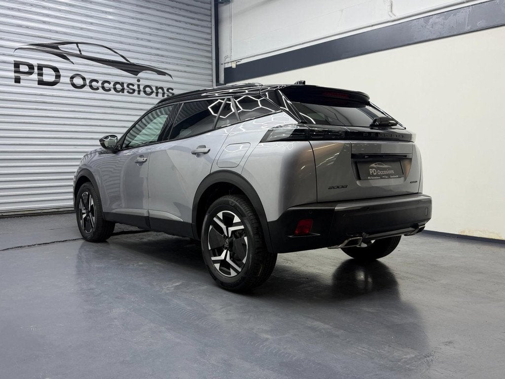 Peugeot 2008 1.2 Hybrid 145PK GT - Camera - Cruise - Keyless, Auto's, Peugeot, Zwart, 1199 cc, Leder en Stof, Origineel Nederlands