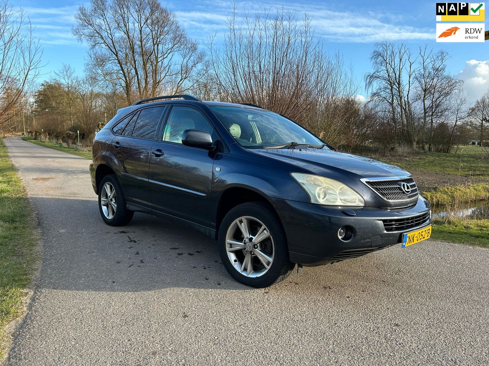 Lexus RX 400h Executive / Export / Schuif-kantel dak / Autom, Auto's, 3311 cc, Gebruikt, Blauw, Stoelverwarming