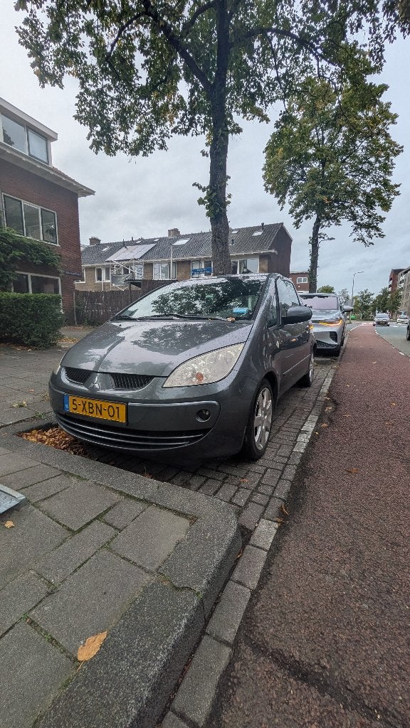Mitsubishi Colt 1.5 Mivec CZ3 2005 Grijs. APK Juli 2027!, Auto's, Voorwielaandrijving, 4 cilinders, Colt, Leder