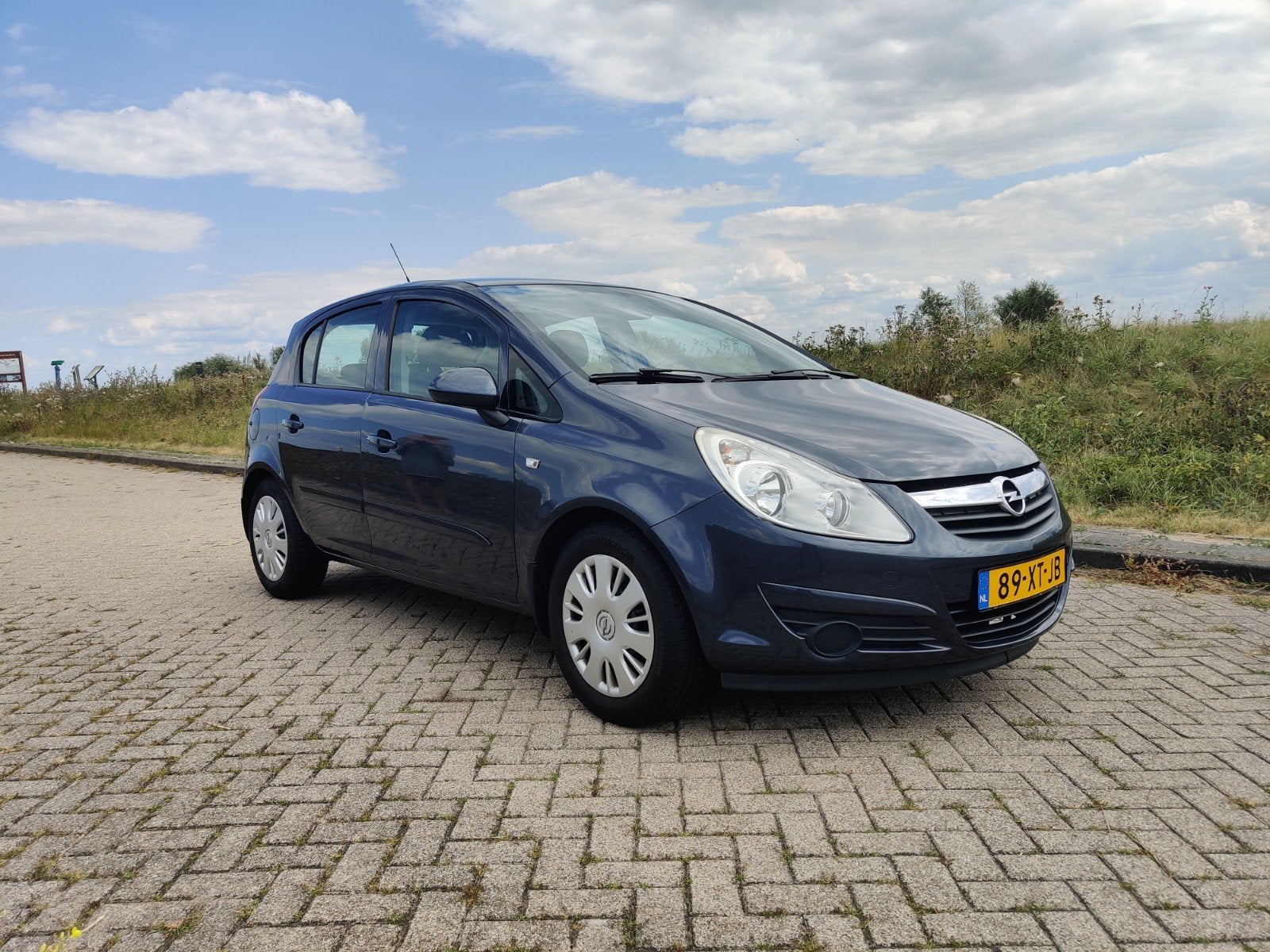 Opel Corsa 1.2 16V 5D Easytronic 2007 Grijs, Auto's, Opel, Stof, 4 cilinders, 1229 cc, 49 €/maand