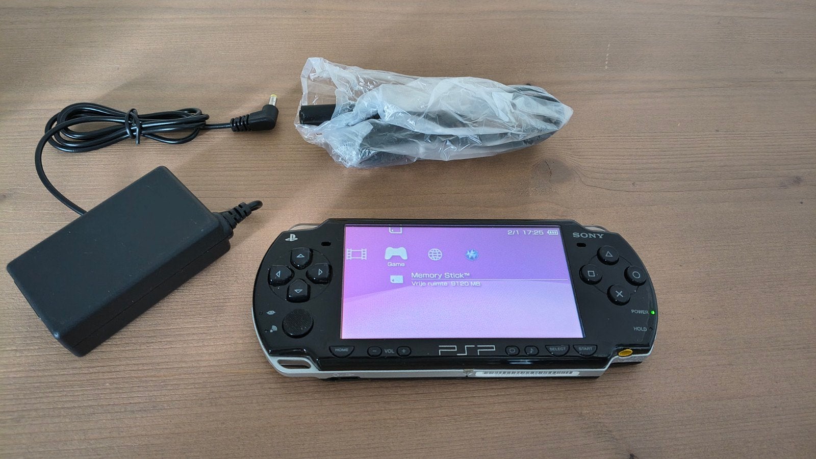 Sony PSP 2004 Zwart - Topstaat - compleet inclusief games, Ophalen of Verzenden, Gebruikt, Met games, PSP Slim
