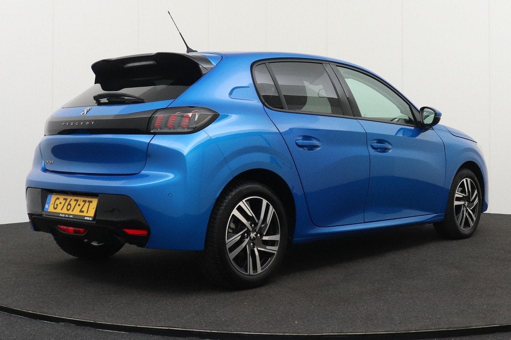 Peugeot 208 1.2 101 PK Aut. Allure Camera Climate Navi 16'LM, Auto's, Peugeot, 101 pk, Gebruikt, Blauw, Leder en Stof