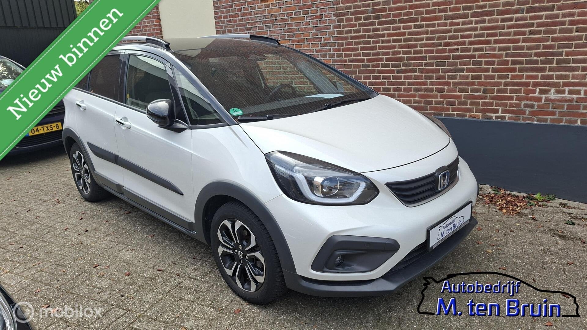 Honda Jazz 1.5 e:HEV Crosstar Two-tone (zwart dak), Auto's, Honda, 4 cilinders, 1253 kg, Bedrijf, Hybride Elektrisch/Benzine