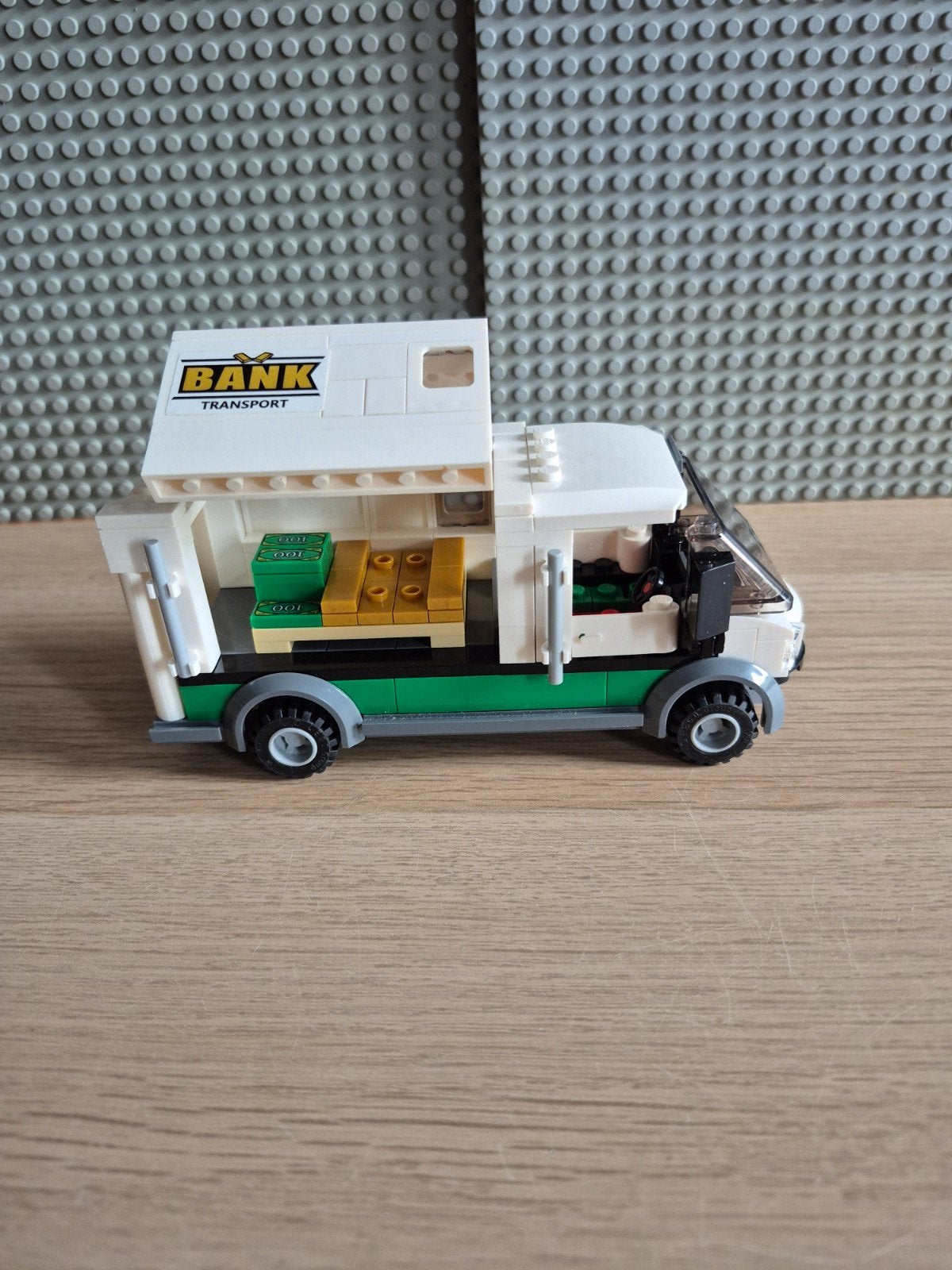 Lego Geldauto met geld - Bank Transport, Kinderen en Baby's, Speelgoed | Duplo en Lego, Lego, Ophalen of Verzenden, Inclusief accessoires