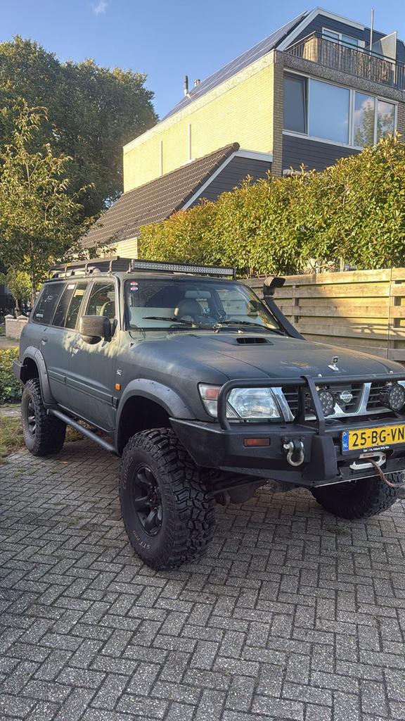 Nissan Y61 1998 2,8 SE LWB grijs kenteken., Auto's, Beige, 129 pk, Leder en Stof, 2280 kg