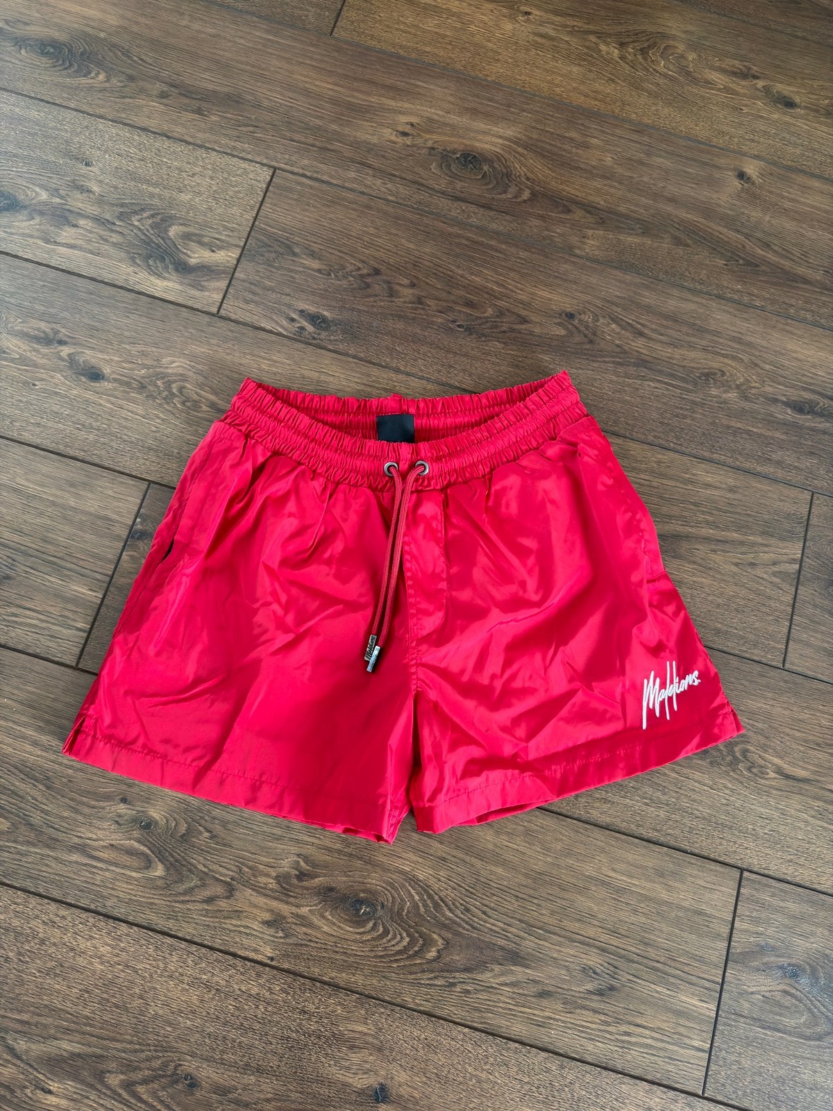 Malelions zwembroek rood, Kleding | Heren, Badmode en Zwemkleding, Ophalen of Verzenden, Maat 52/54 (L), Rood, Zwemshort