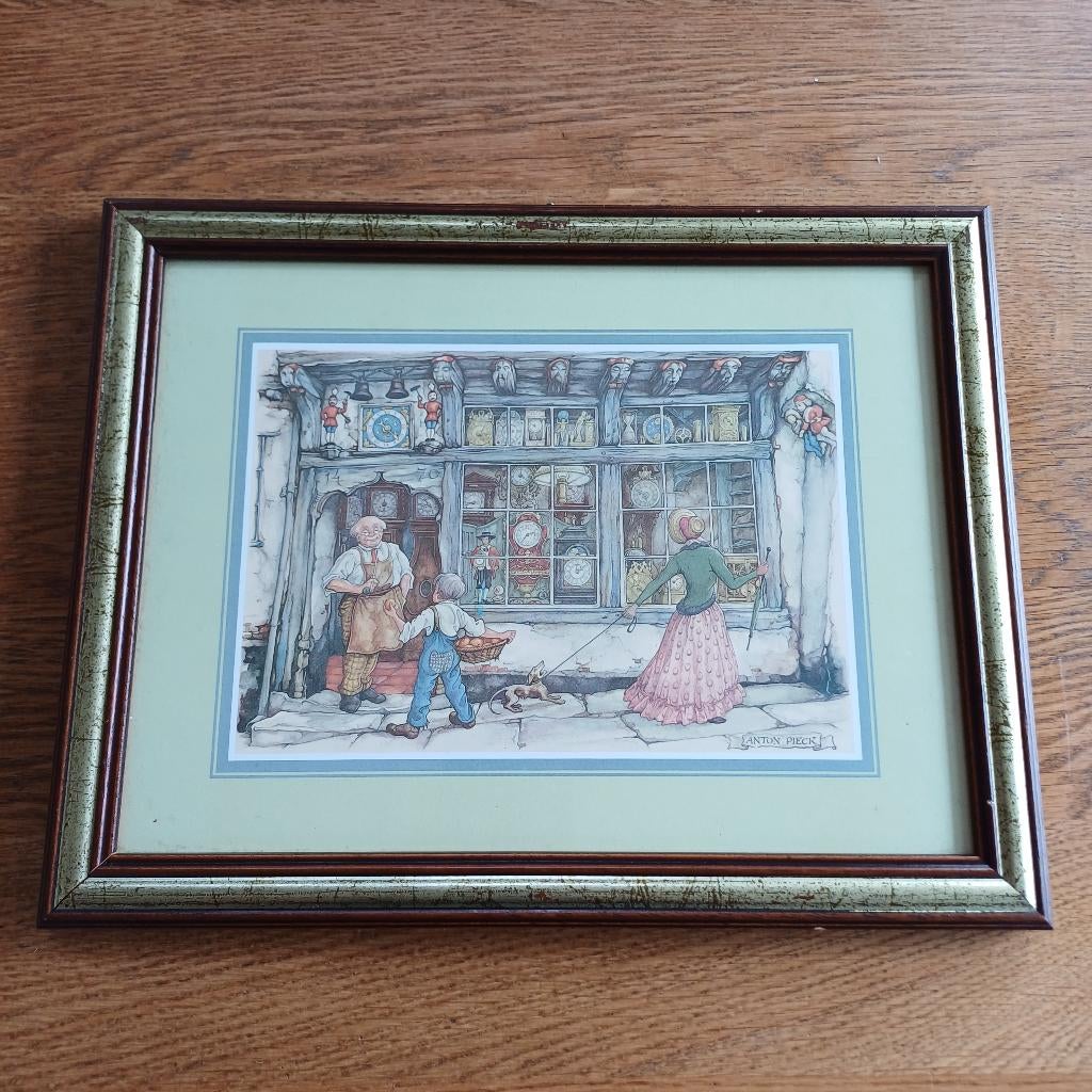 Ingelijste prent Anton Pieck – Klokkenwinkel, Gebruikt, 1980 tot heden, Ophalen of Verzenden, Gebouw