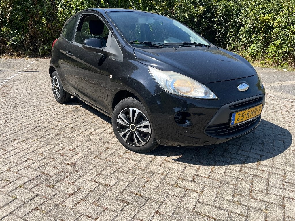Ford Ka 1.2 51KW 2009 Zwart, Auto's, Voorwielaandrijving, Stof, 1242 cc, 4 cilinders