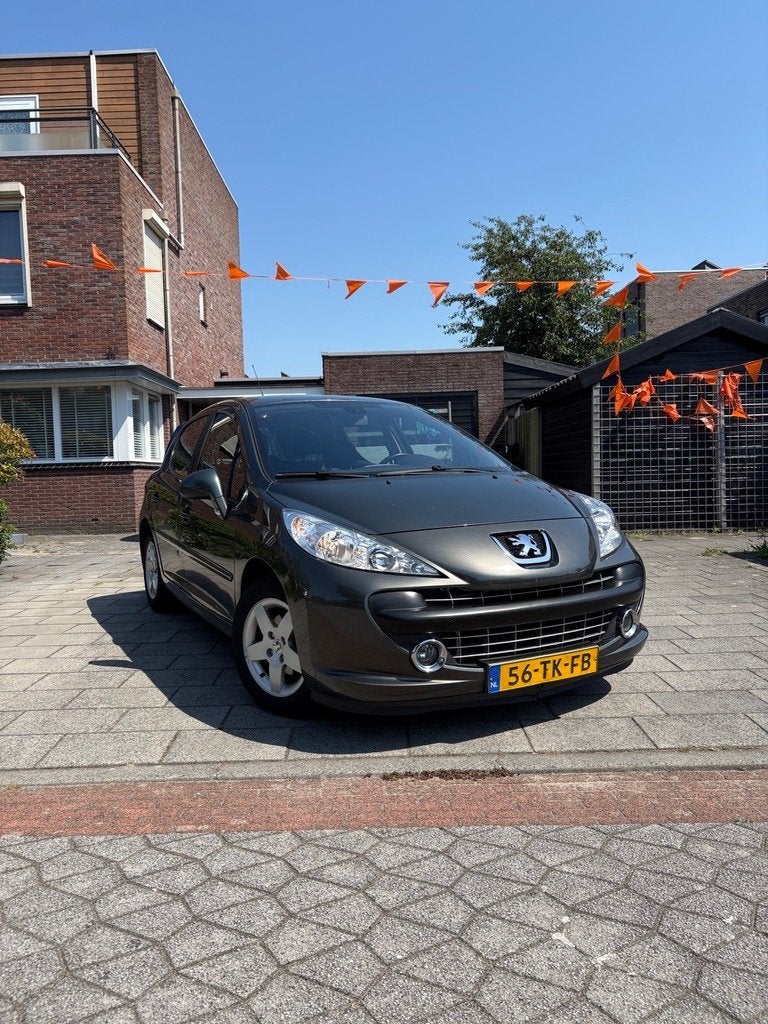 Peugeot 207 1.4 16V 5DRS 2006 Grijs, Auto's, Stof, 1360 cc, Zwart, 4 cilinders