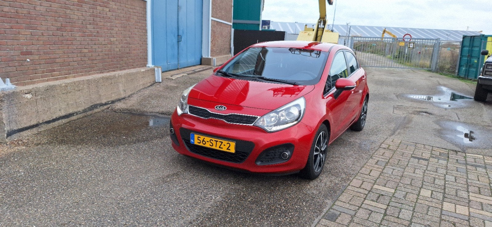Kia Rio 1.2 I 5DRS 2012 Rood, Auto's, 450 kg, 40 €/maand, 4 cilinders, Origineel Nederlands
