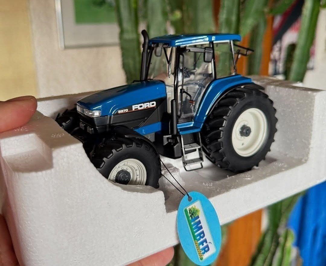 new holland ford 70 serie 1/32, Hobby en Vrije tijd, Ophalen of Verzenden, Tractor of Landbouw, Overige merken