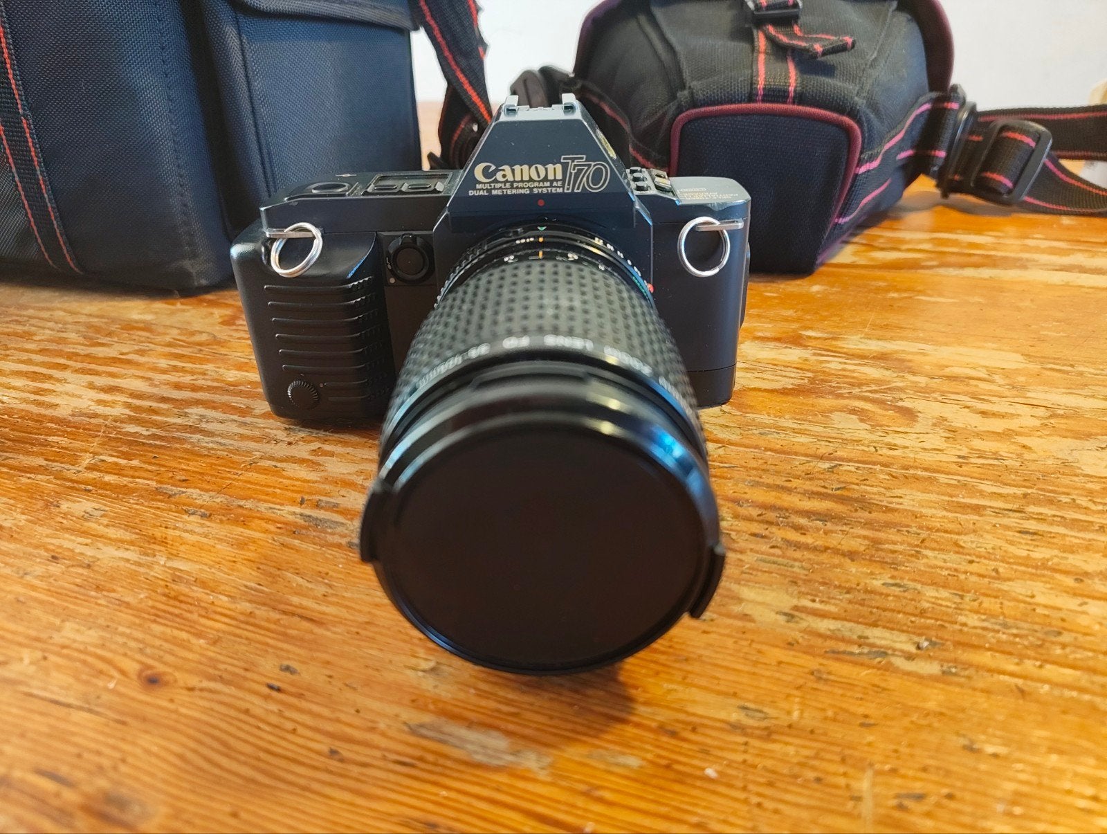 Canon T70 Spiegelreflexcamera met 35-105mm lens en flitser, Audio, Tv en Foto, Ophalen of Verzenden, Gebruikt, Spiegelreflex, Canon