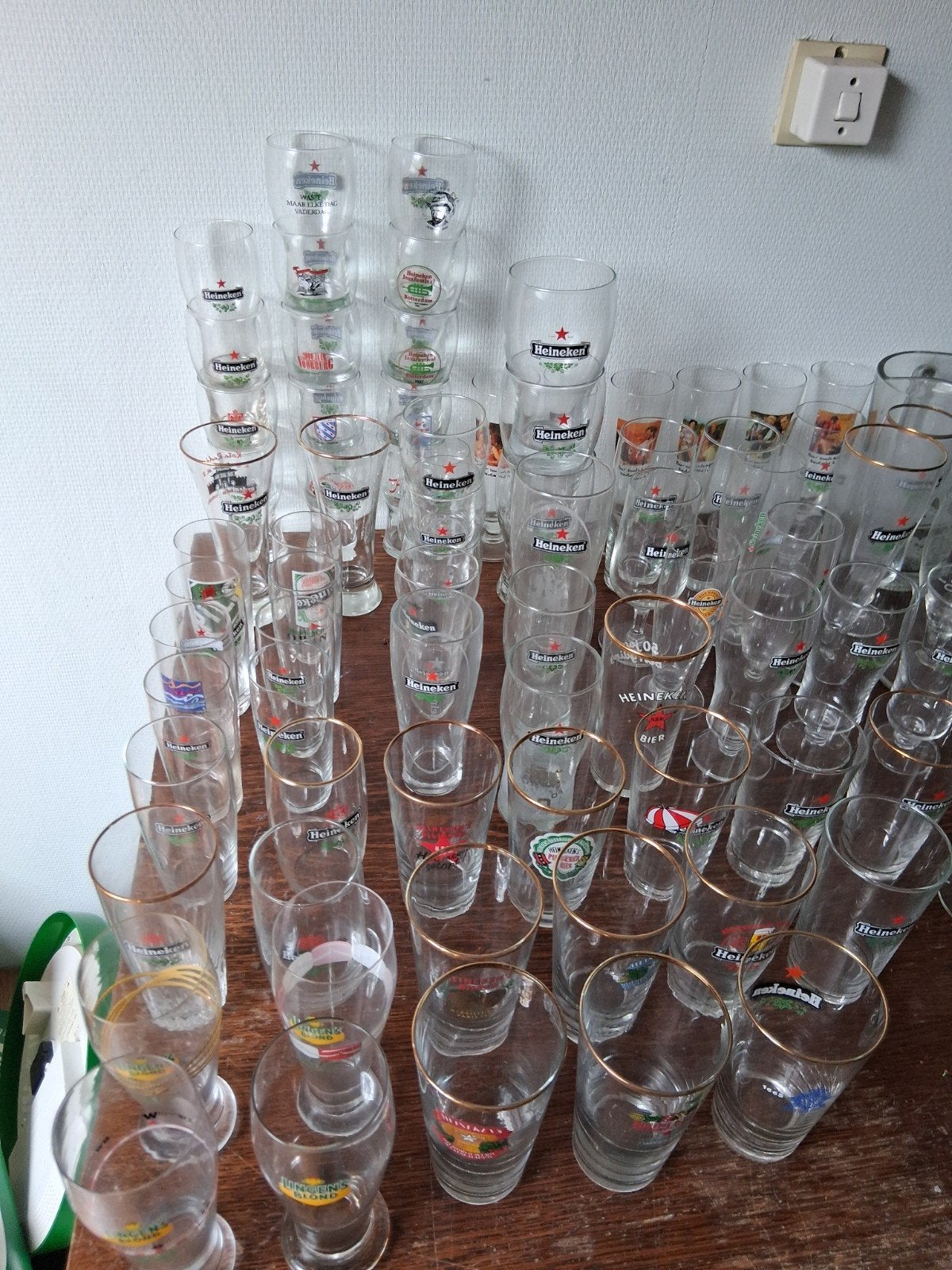 Grote collectie van ruim 100 verschillende Heineken glazen, Ophalen, Zo goed als nieuw, Glas of Glazen, Heineken