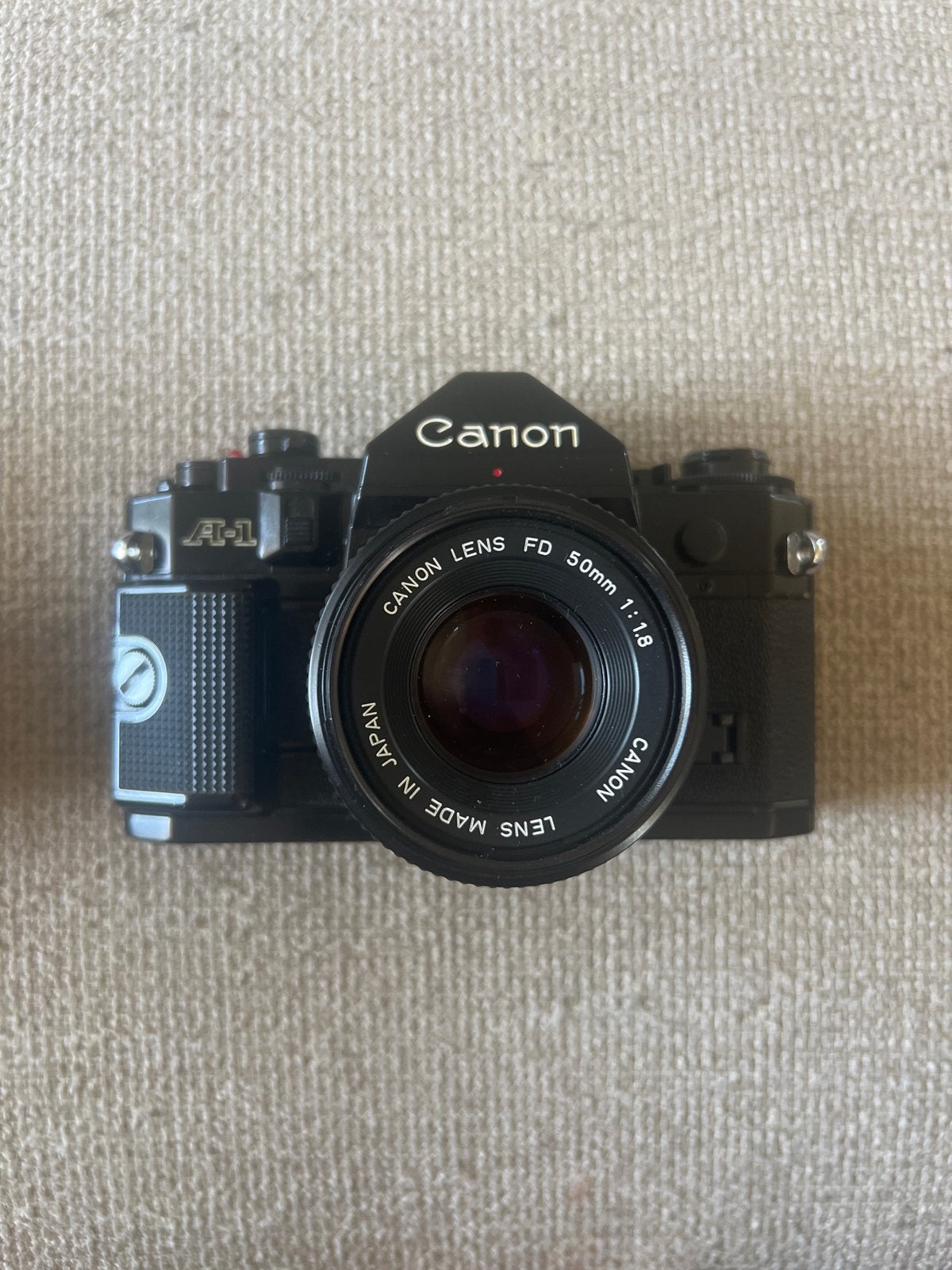 Canon A-1 Spiegelreflexcamera met FD 50mm 1:1.8 lens, Audio, Tv en Foto, Fotocamera's Analoog, Verzenden, Gebruikt, Spiegelreflex
