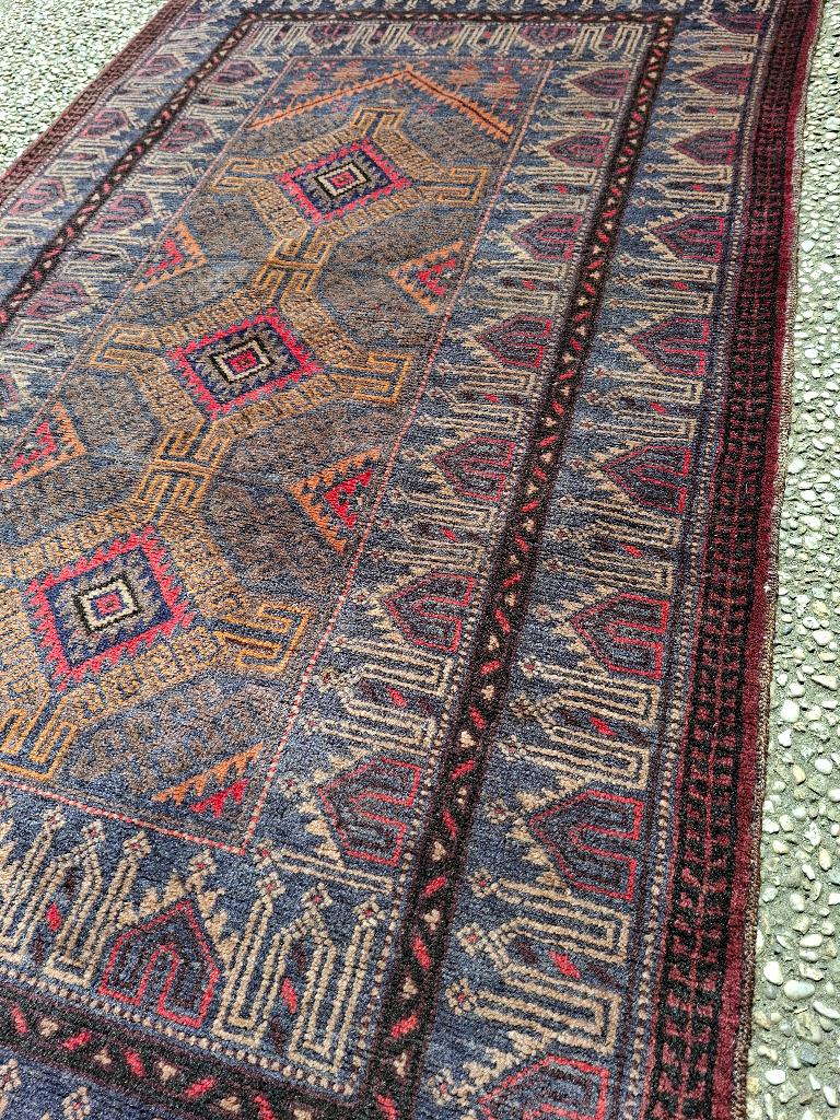 Baluch tapijt, Ophalen