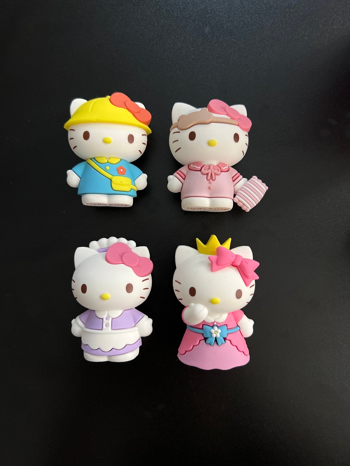 Set van 4 Hello Kitty figuurtjes - Diverse outfits, Ophalen, Nieuw