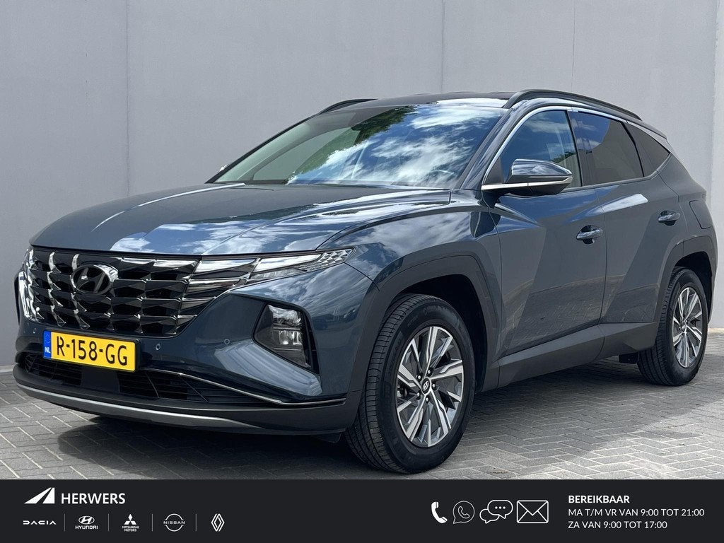 Hyundai Tucson 1.6 T-GDI HEV Comfort / Trekhaak (1.650KG) /, Auto's, Hyundai, Stof, Gebruikt, Euro 6, 4 cilinders