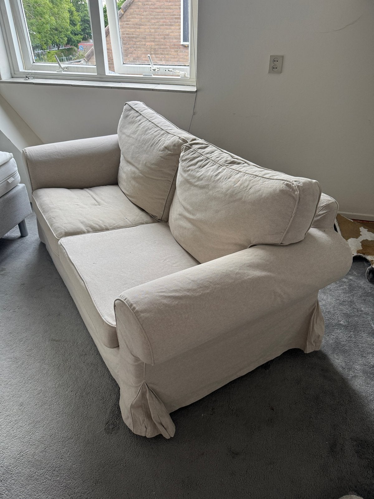 Ektorp bank (beige/zand), Huis en Inrichting, Banken | Sofa's en Chaises Longues, Ophalen, Gebruikt, 150 tot 200 cm, Tweepersoons
