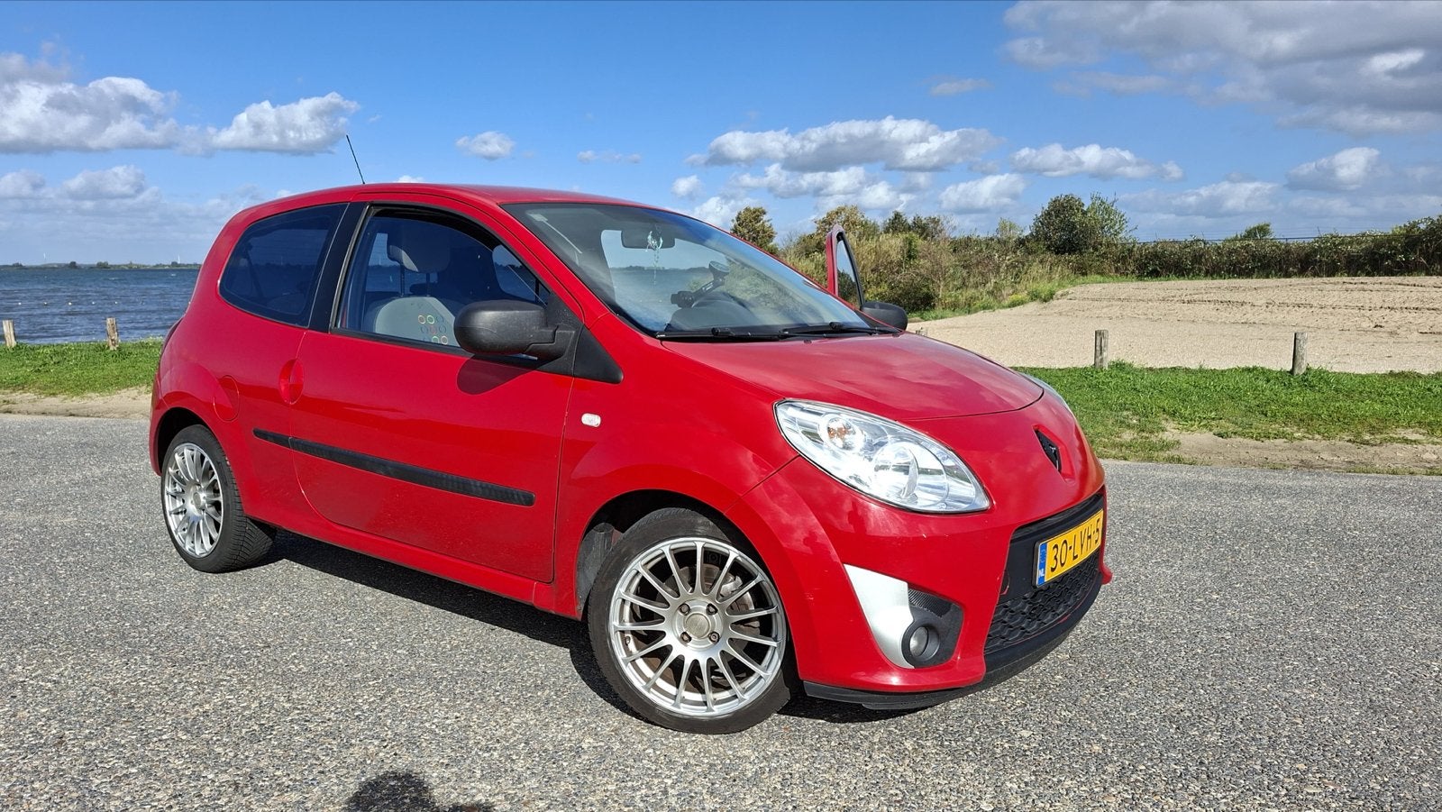 Renault Twingo 1.2 16V 2010 Rood, Auto's, 4 cilinders, 4 stoelen, Origineel Nederlands, Handgeschakeld