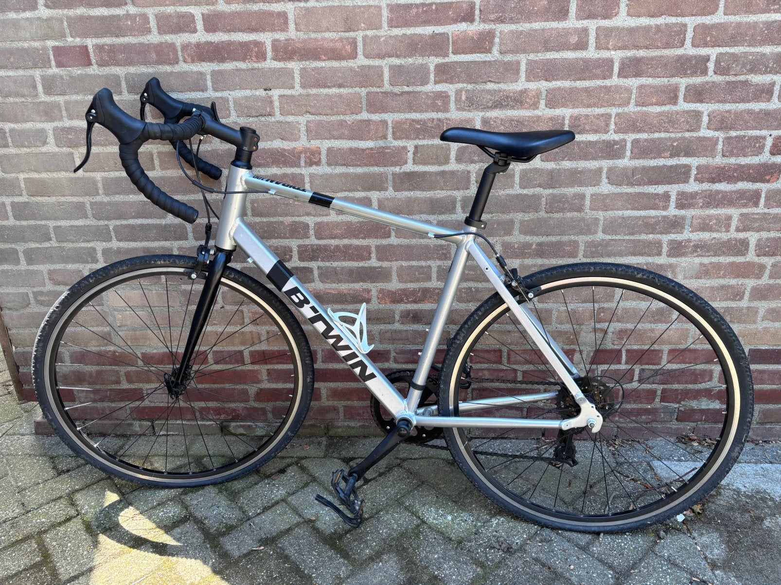 Racefiets triban 100, Fietsen en Brommers, Overige merken, Minder dan 10 versnellingen, Aluminium, Ophalen of Verzenden