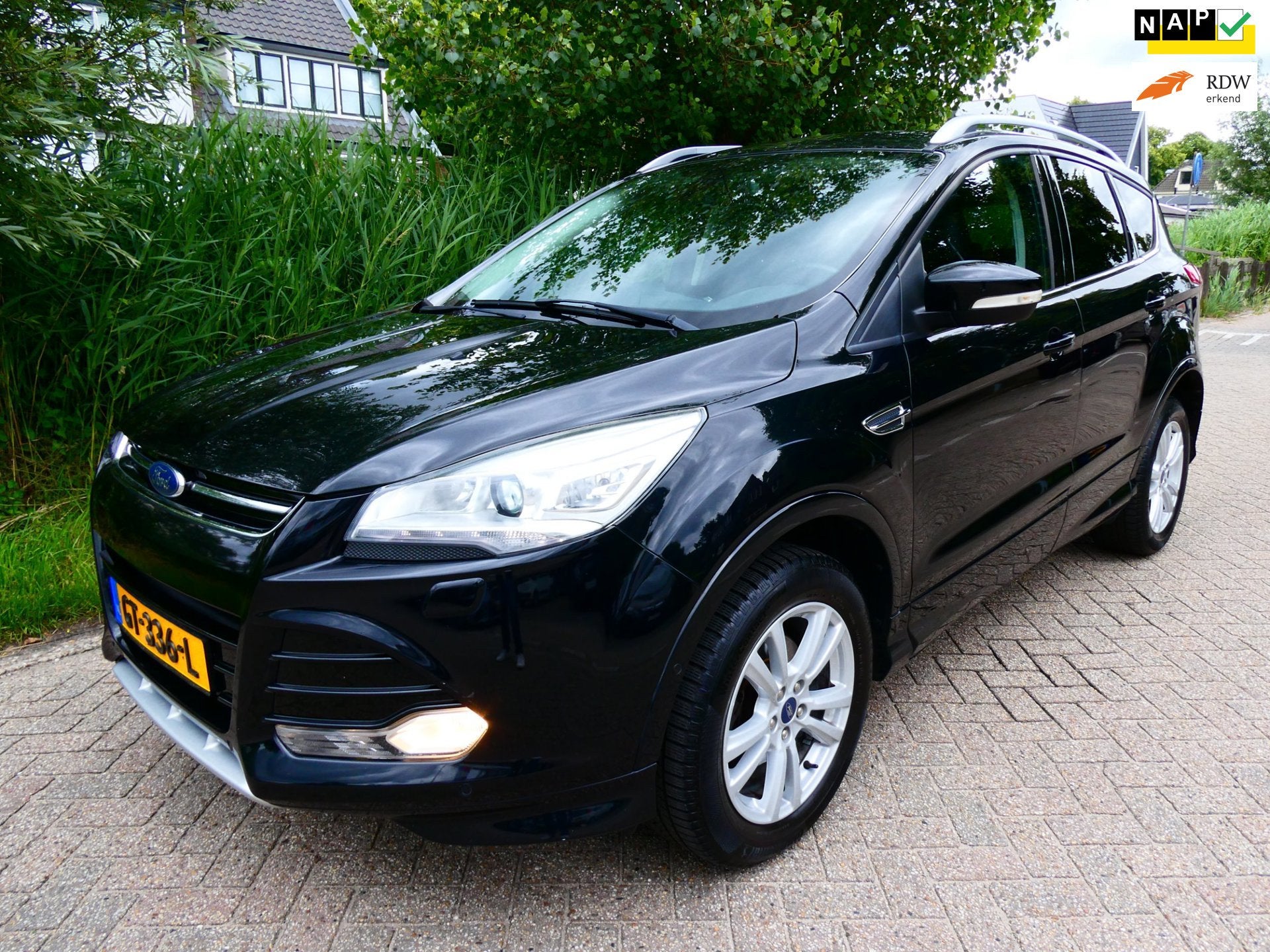 Ford Kuga 1.5 Titanium Styling Pack 150pk Clima Navi Trekhaa, 4 cilinders, Leder en Stof, Zwart, Origineel Nederlands