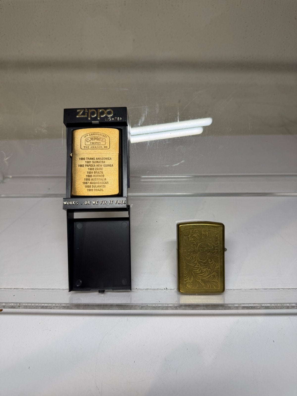 Vintage Zippo aanstekers - Camel en Niagara Falls, Ophalen of Verzenden, Gebruikt, Aansteker