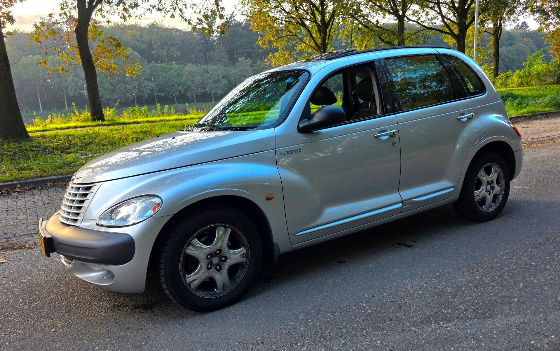 Chrysler PT Cruiser 2.0-16V Limited - Automaat - Leder - AC, Auto's, 450 kg, Gebruikt, Verwarmde buitenspiegels, 4 cilinders