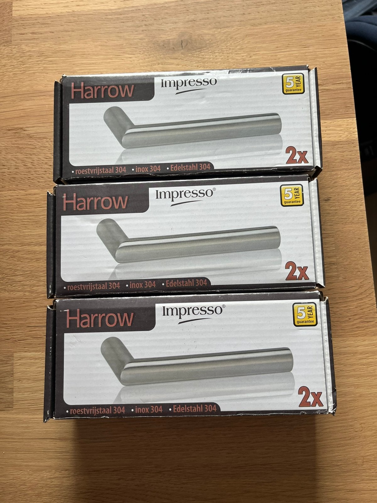 3 deurkrukken met 3 deurrozetten Harrow Impresso RVS, Ophalen of Verzenden, Zo goed als nieuw, Rvs, Klink of Kruk