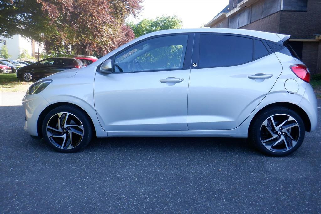Hyundai I10 1.0i 67pk 30 JAAR EDITION - ALLE OPTIES 29.000KM, Keurmerk '100% Onderhouden', 12 maanden, Stof, Gebruikt