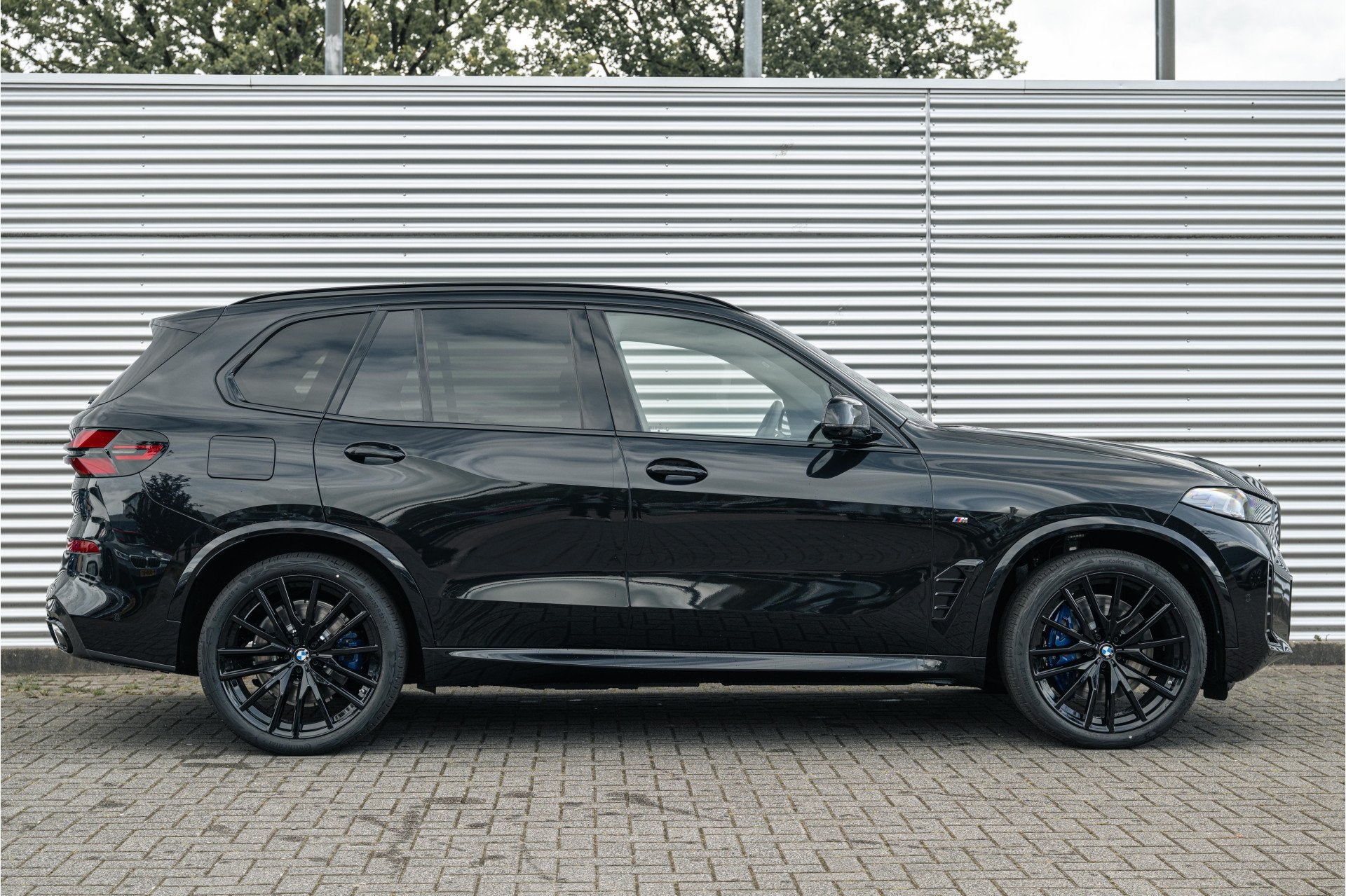 BMW X5 xDrive50e M Sport Automaat / Trekhaak / Panoramadak /, Auto's, Automaat, 2395 kg, Zwart, Leder