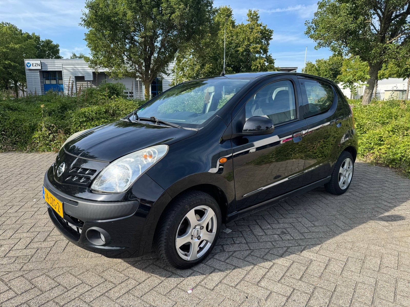 Nissan Pixo 1.0 50KW 5D 2009 Zwart AIRCO / ELEKTRISCHE RAMEN, Voorwielaandrijving, Stof, 200 kg, 4 stoelen