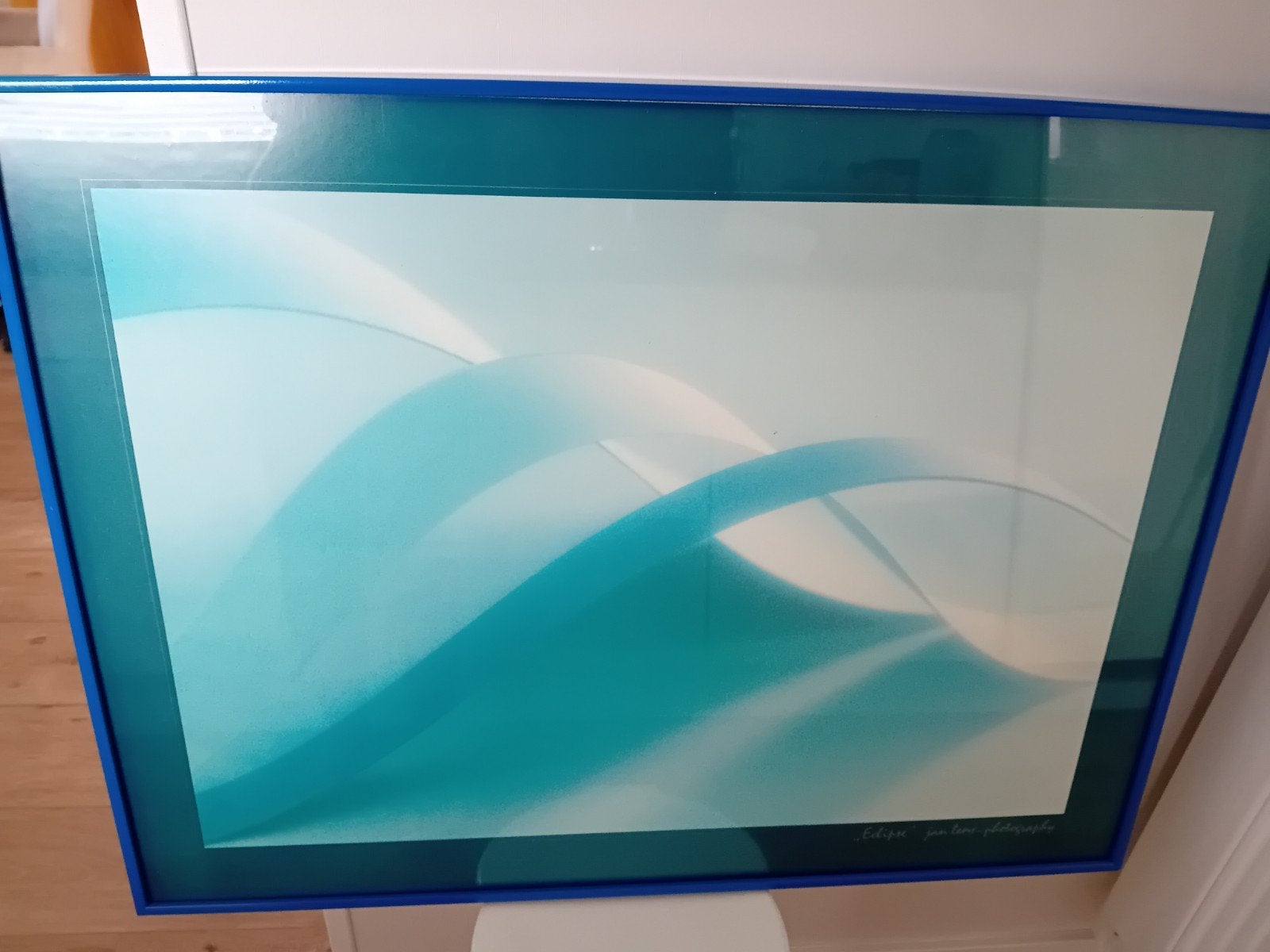 Reproductie in blauwe wissellijst, Ophalen