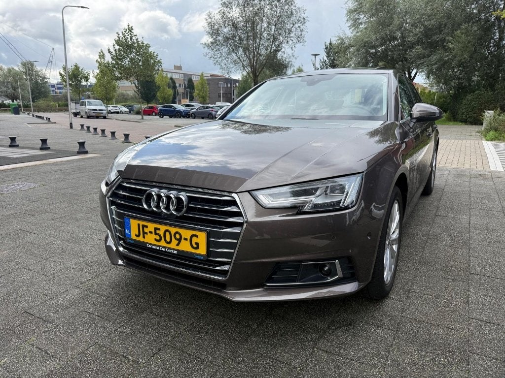 Audi A4 2.0 TFSI Ultra Sport AUT DAK NAVI CLIMA PDC DIG DASH, Dealer onderhouden, 1380 kg, Zwart, A4