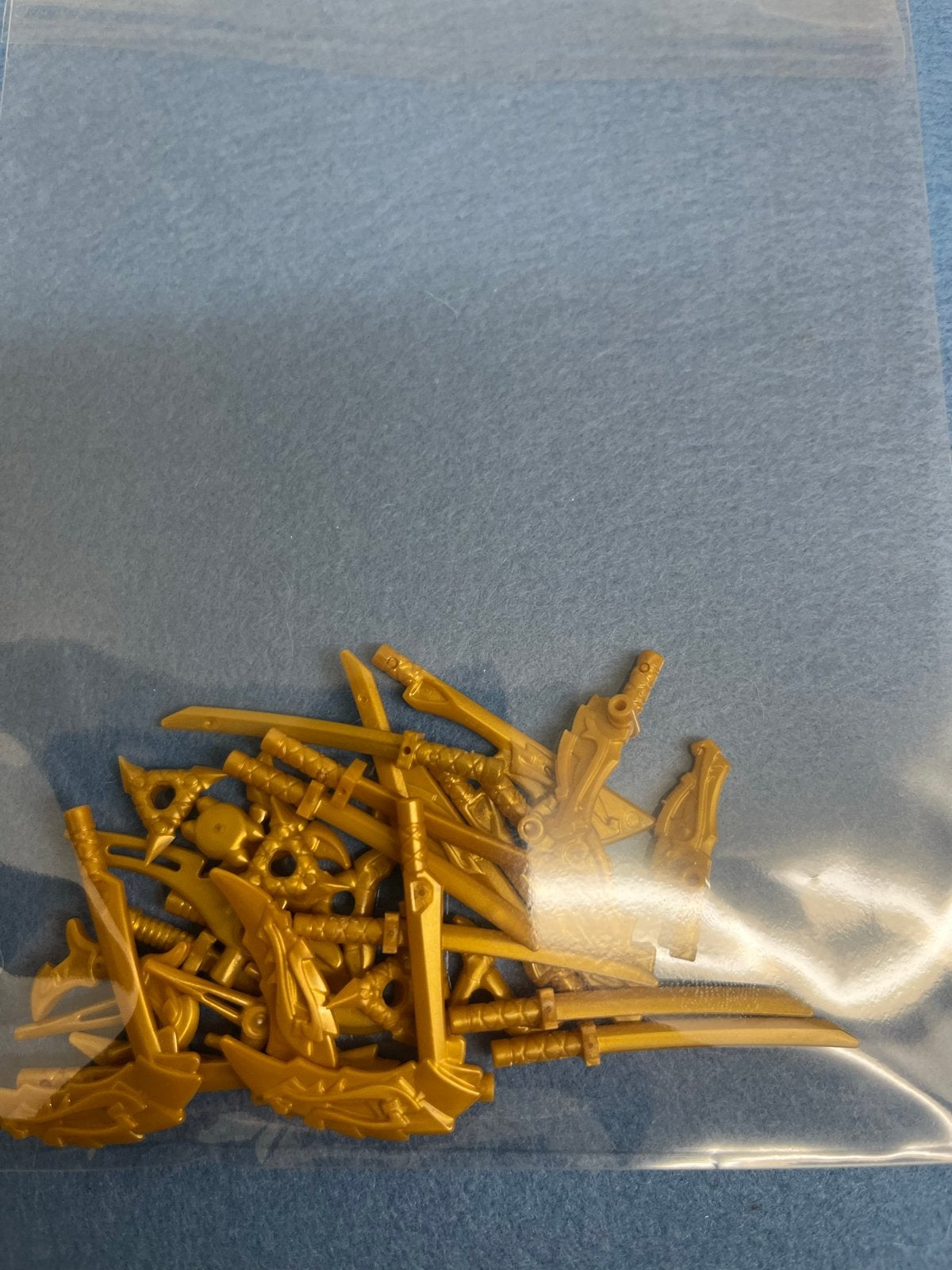Gouden Lego Ninjago wapens - zwaarden, zeisen, shurikens, Ophalen of Verzenden, Zo goed als nieuw, Overige merken
