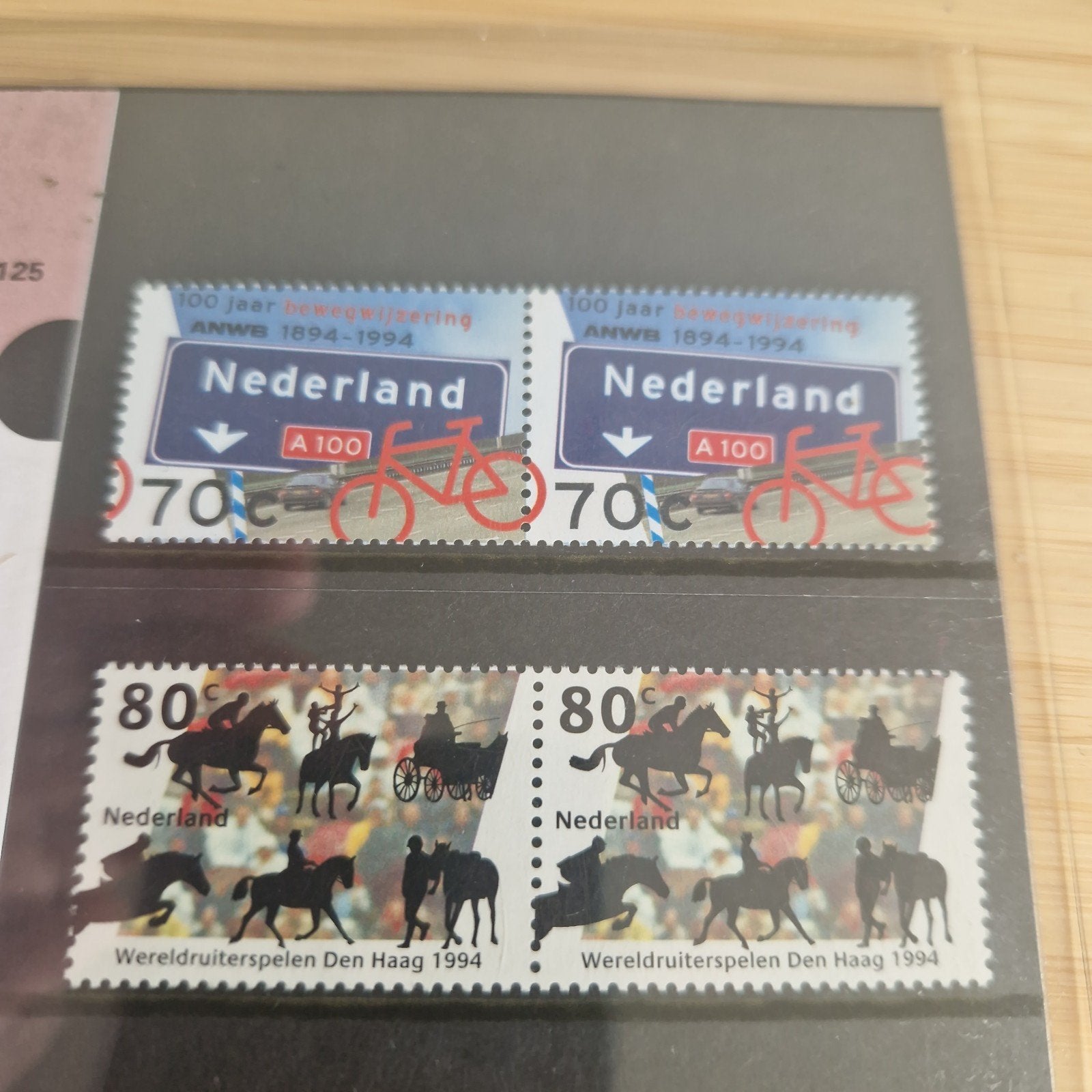 Postzegelmapje 125 ANWB en wereld ruiter spelen, Postzegels en Munten, Ophalen of Verzenden