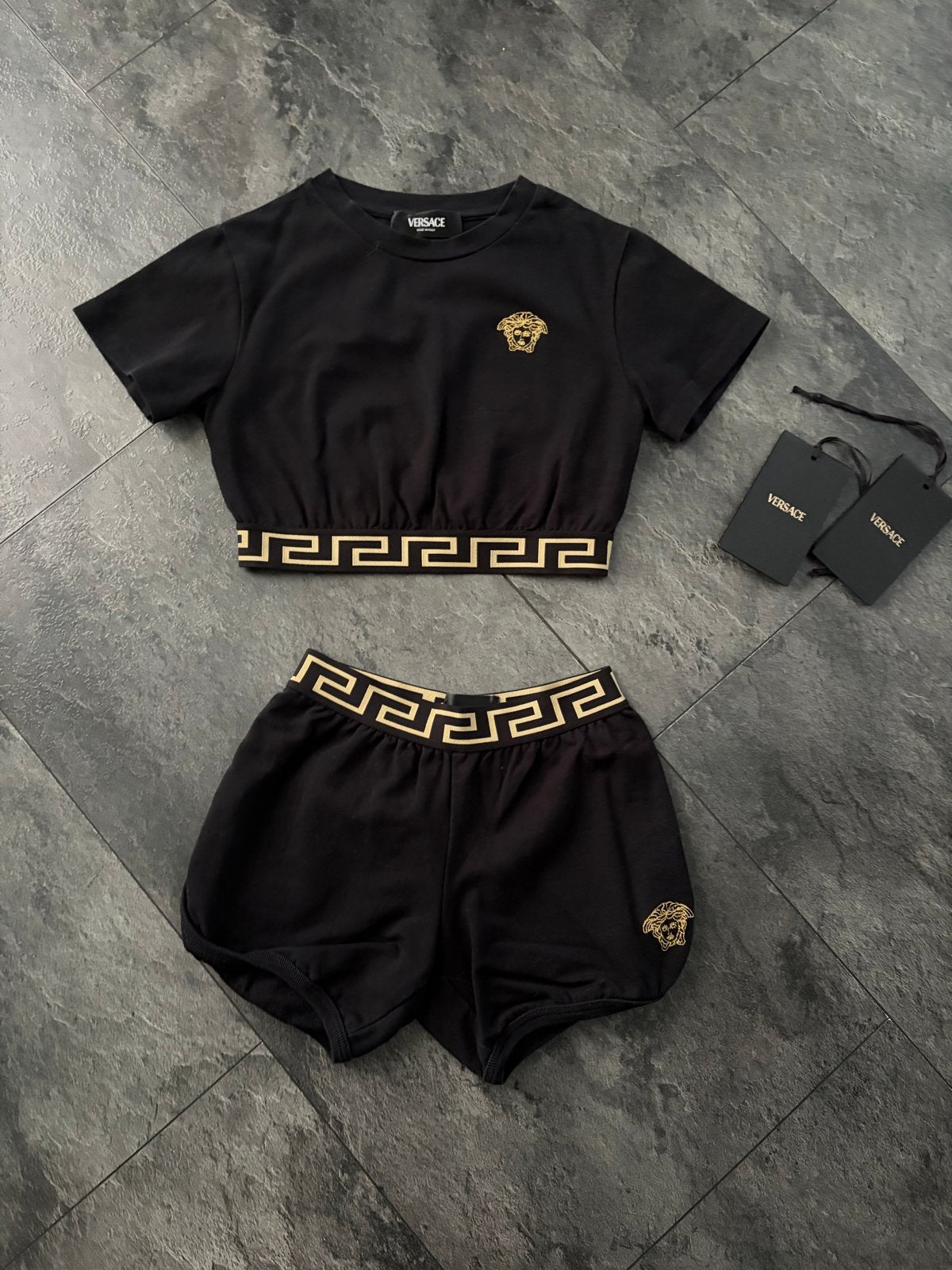 Versace set short en top maat 6 jaar - Zeer nette staat, Ophalen of Verzenden, Zo goed als nieuw, Meisje, Setje