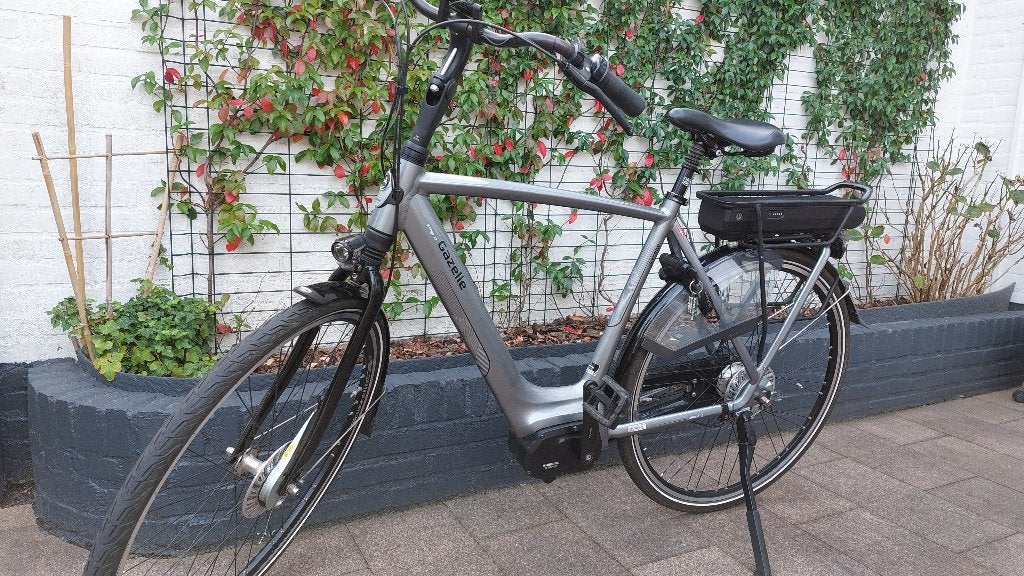 Gazelle Orange C7 met Shimano middenmotor en 2x 500 Wh accu, Ophalen, Zo goed als nieuw, 50 km per accu of meer, 55 tot 59 cm
