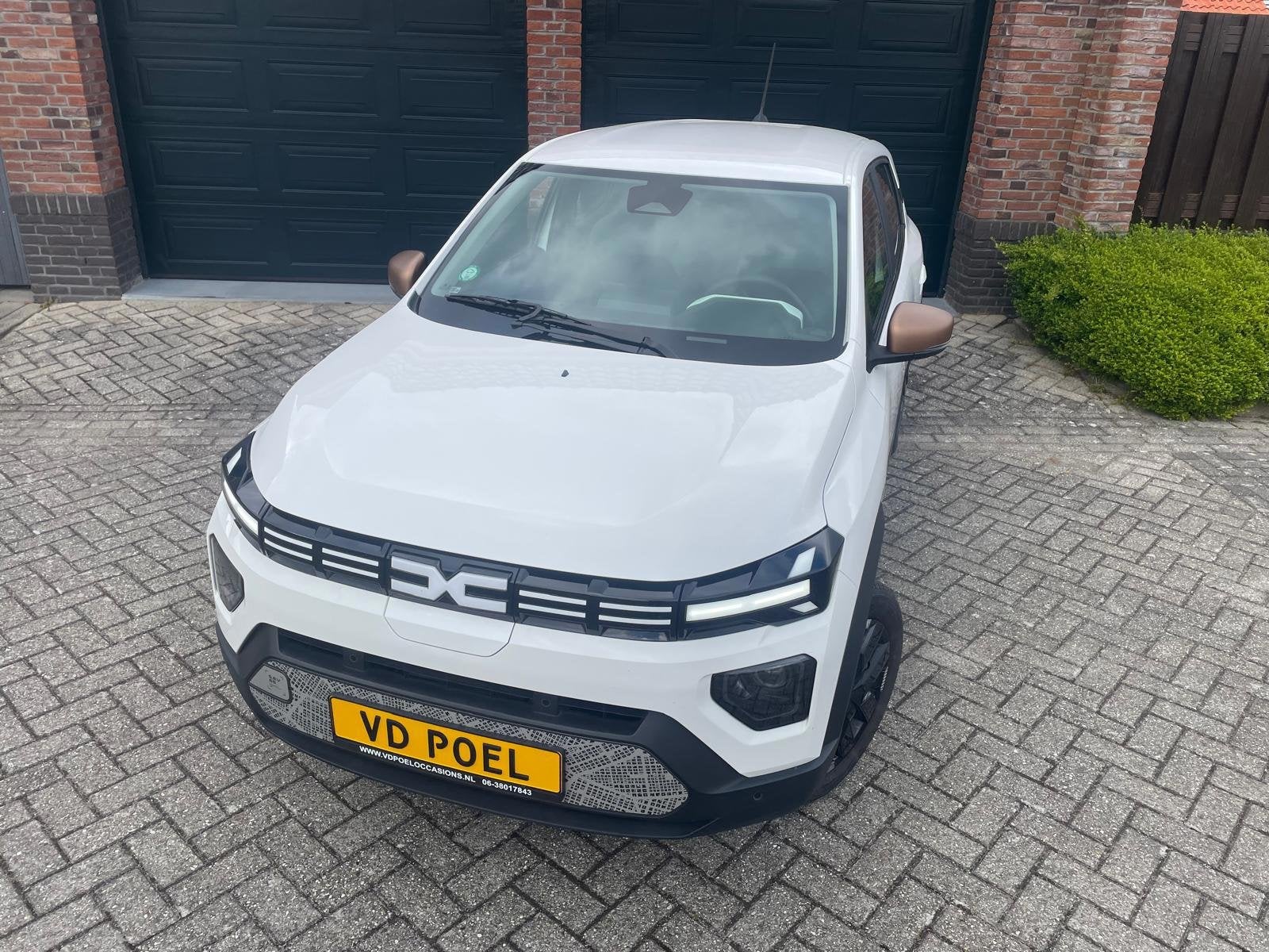 Dacia Spring Extreme 65 26.8 kWh NIEUWSTAAT NAVI AIRCO PDC, Auto's, Dacia, Gebruikt, Parkeersensor, 4 stoelen, Leder en Stof