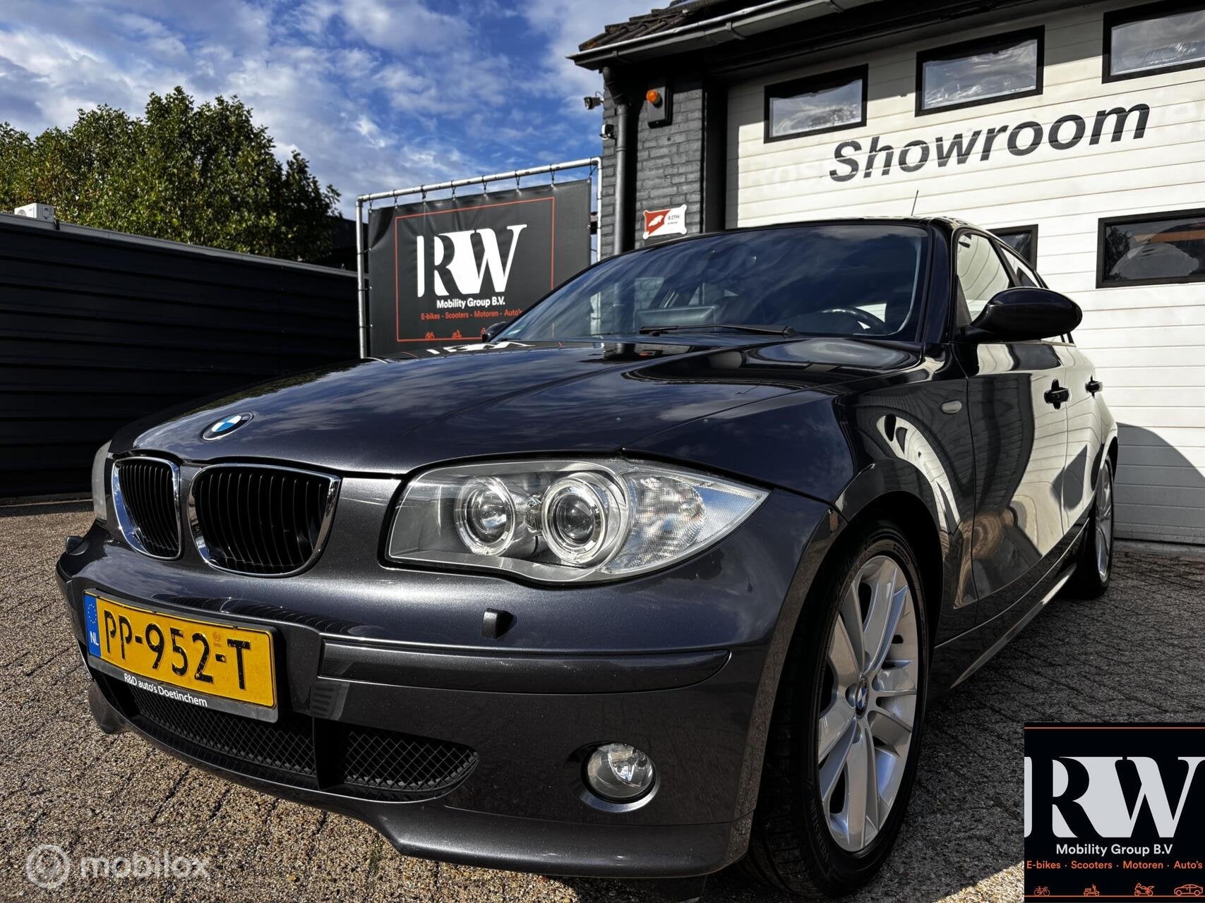 BMW 1-serie 120i Executive *CRUISE*A/C*PANO*NAVI*LEDER*, Auto's, Electronic Stability Program (ESP), Achterwielaandrijving, 4 cilinders